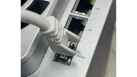 An Ethernet cable plugged into a Thunderbolt hub